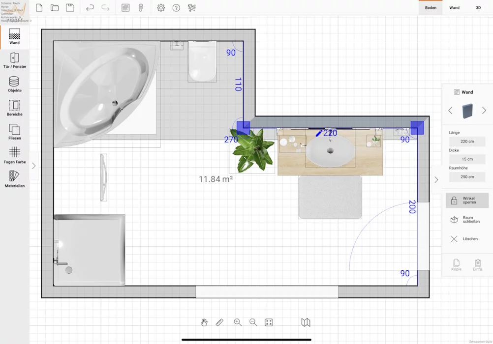 Jemand misst die Abstände im Bad am Bildschirm aus, prüft Wanne, Dusche, Waschbecken und Stauraum. 11,84 qm Fläche.
